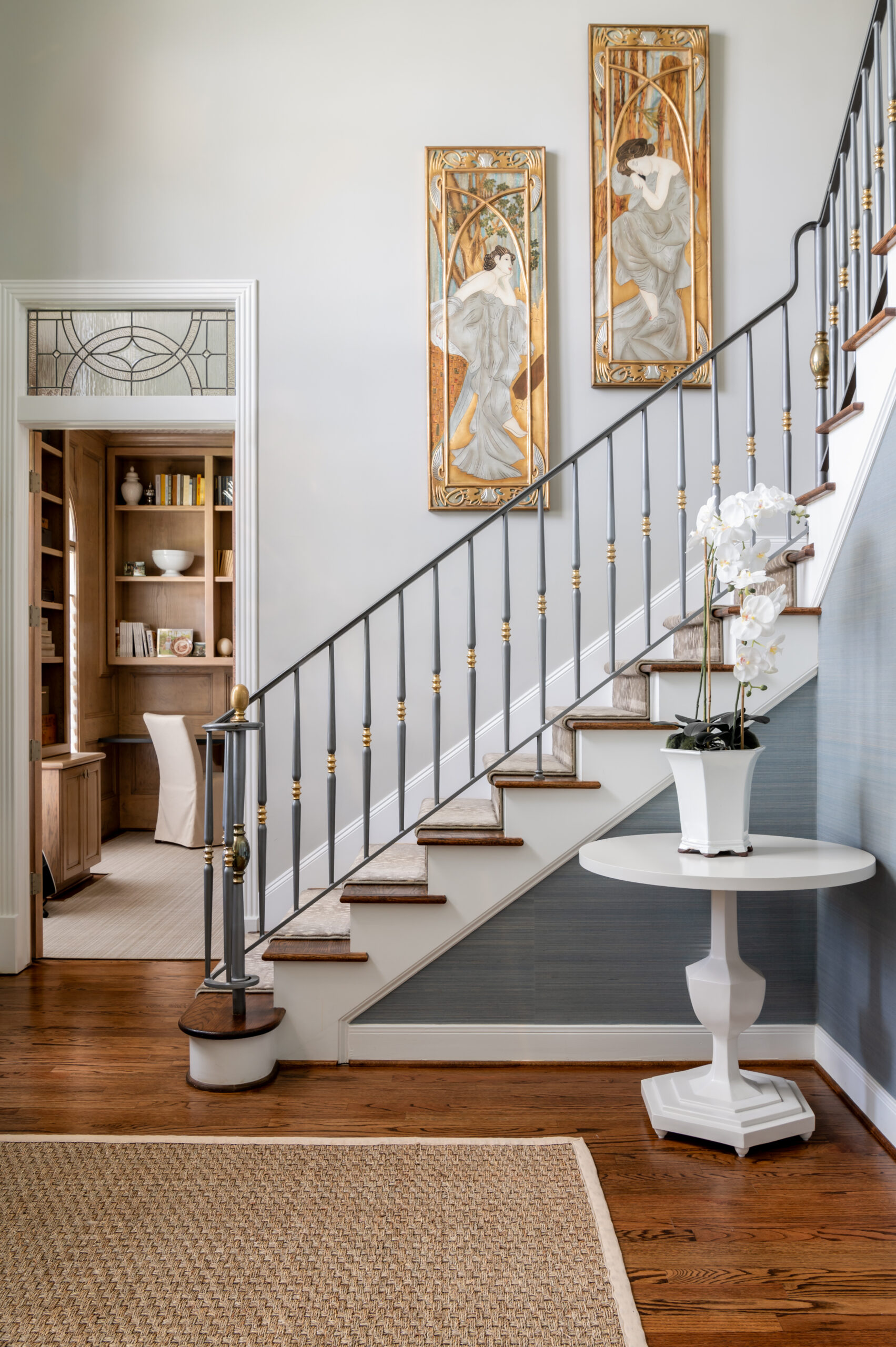 Stunning entryway interior design with chic furniture and wall art