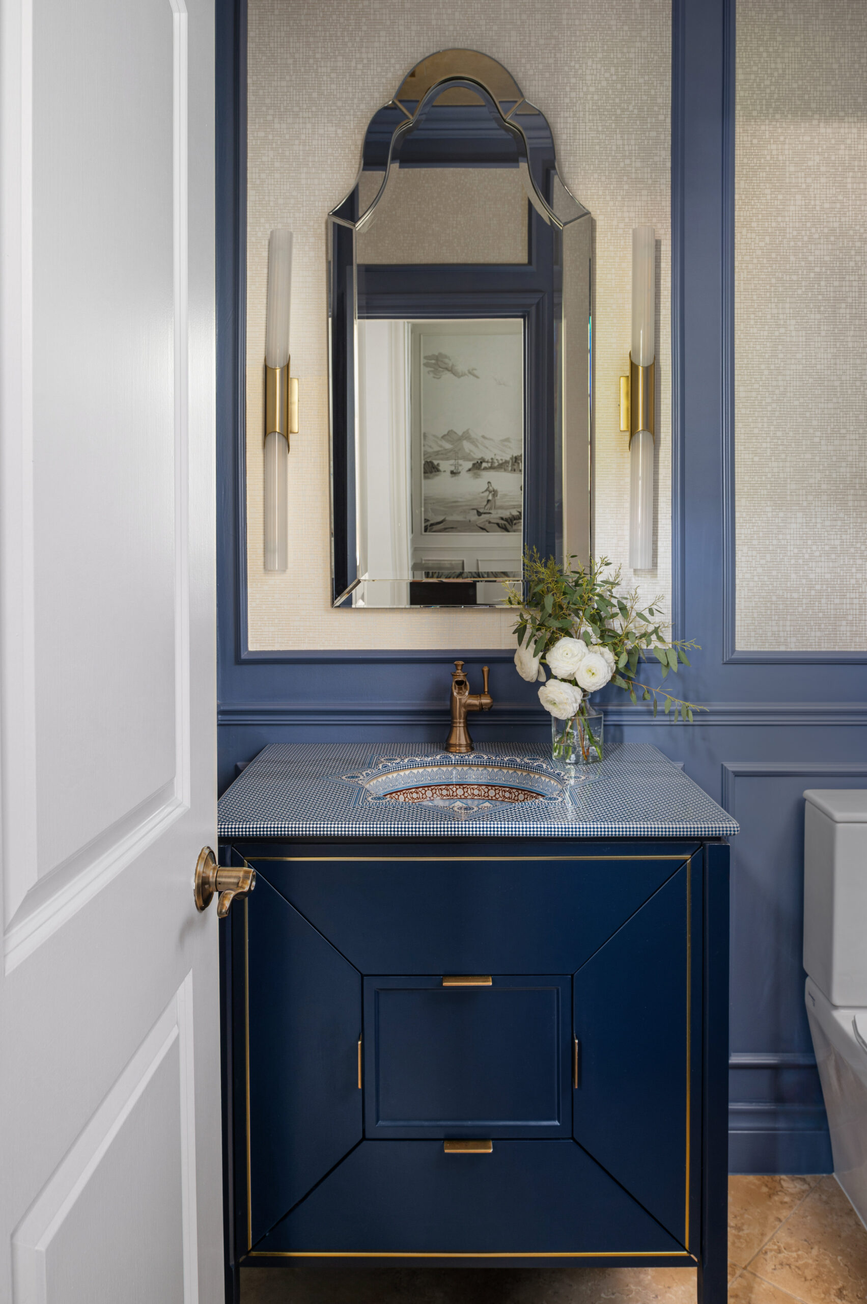 Bathroom interior with blue vanity and blue walls