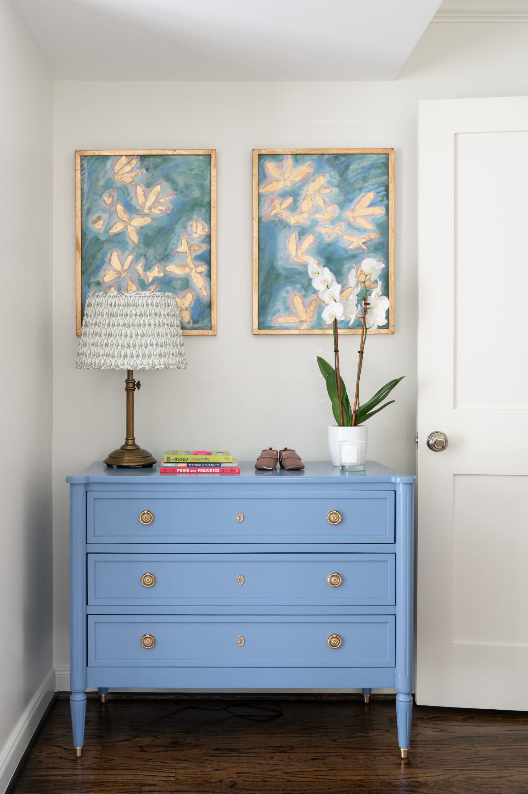 Southern bedroom interior design and decor of a blue dresser