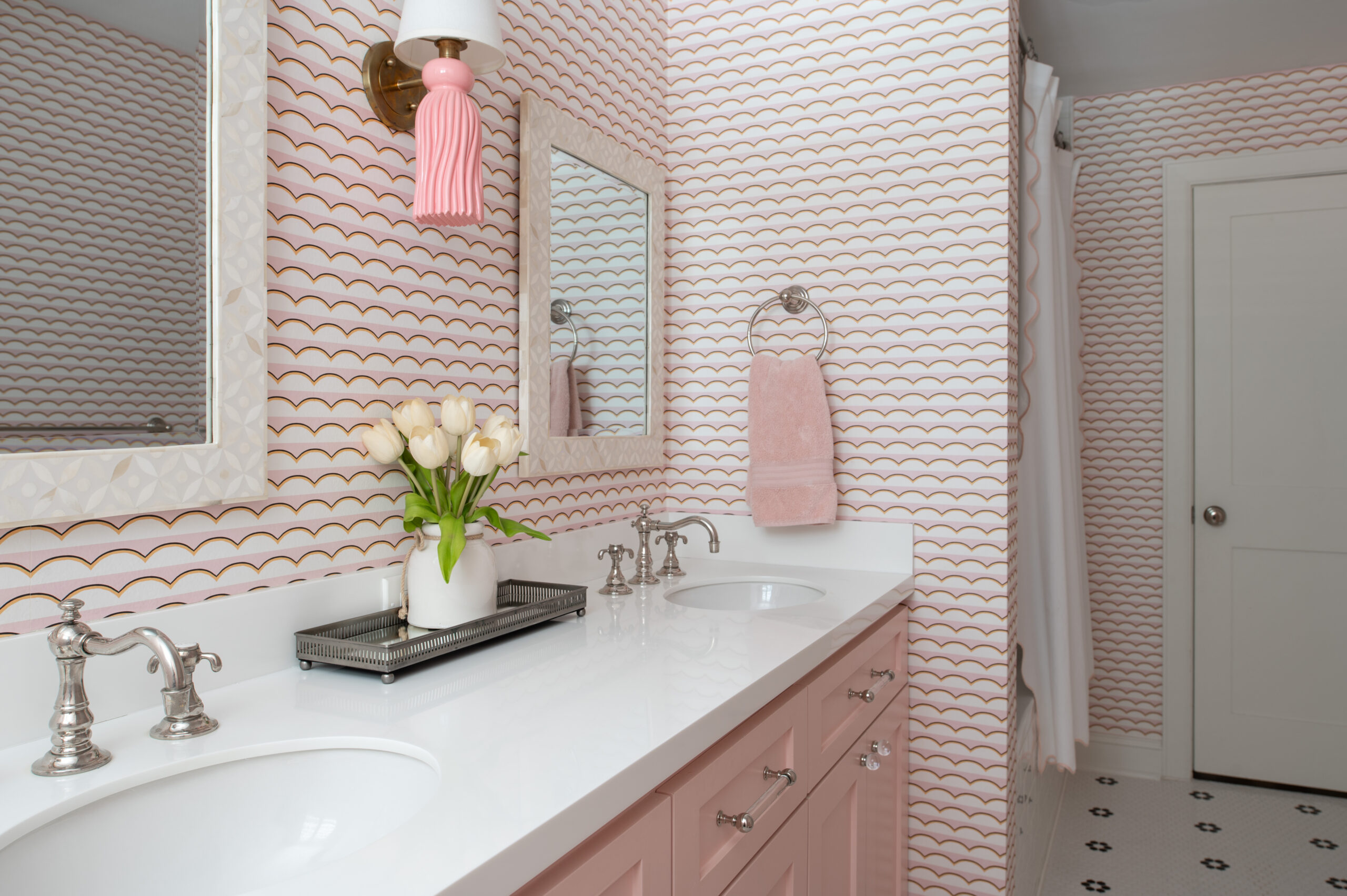 Bathroom interior design with pink wallpaper