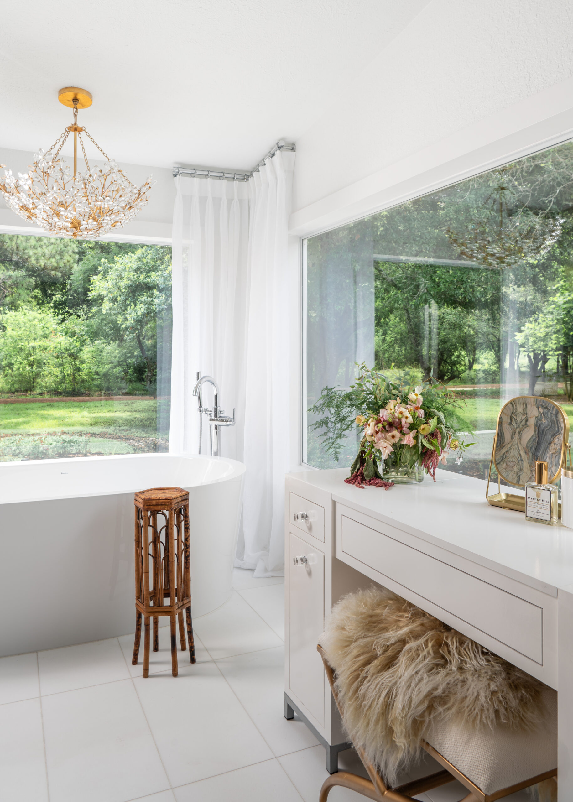 Luxury bathroom interior design with marble walls and spacious tub