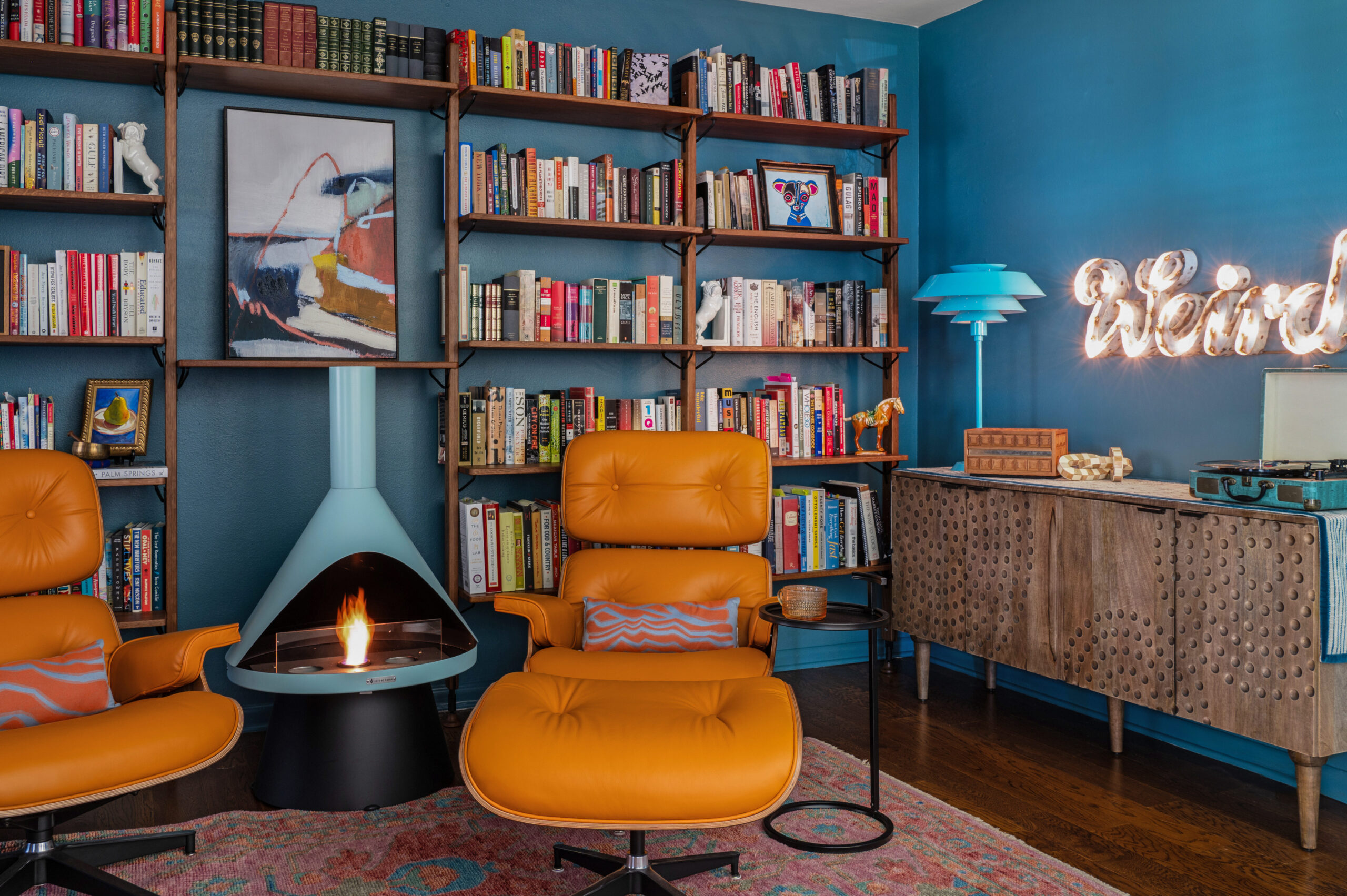 warm and colorful midcentury interior design of an office and library space