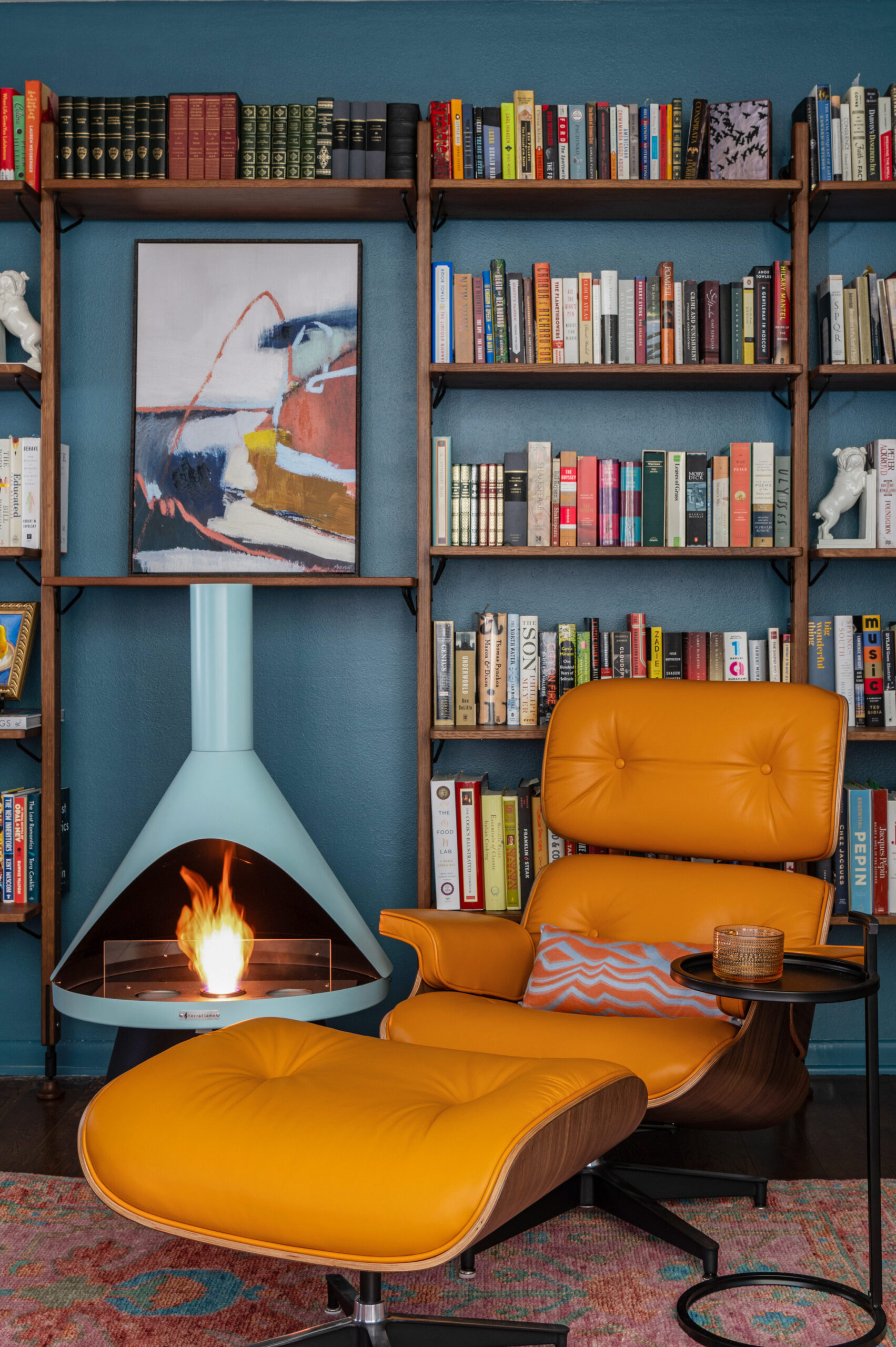 warm and colorful midcentury interior design of an office and library space