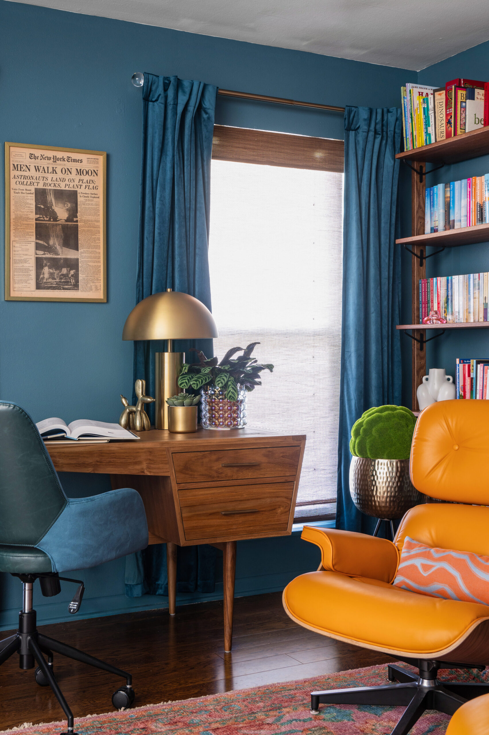 warm and colorful midcentury interior design of an office and library space