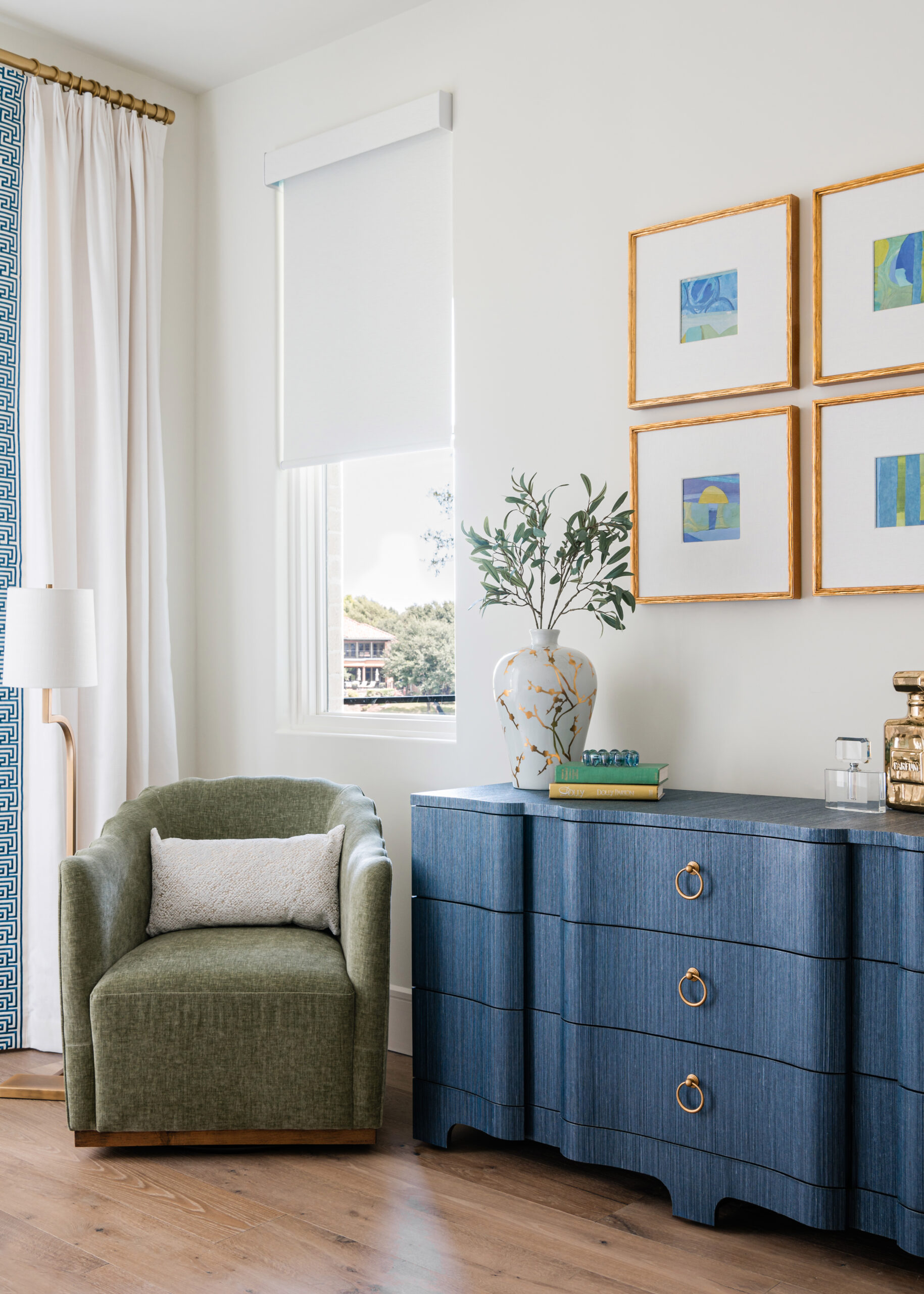 A stylish dresser with modern gold decor, highlighting the mix of textures and finishes that define Texas interior design.