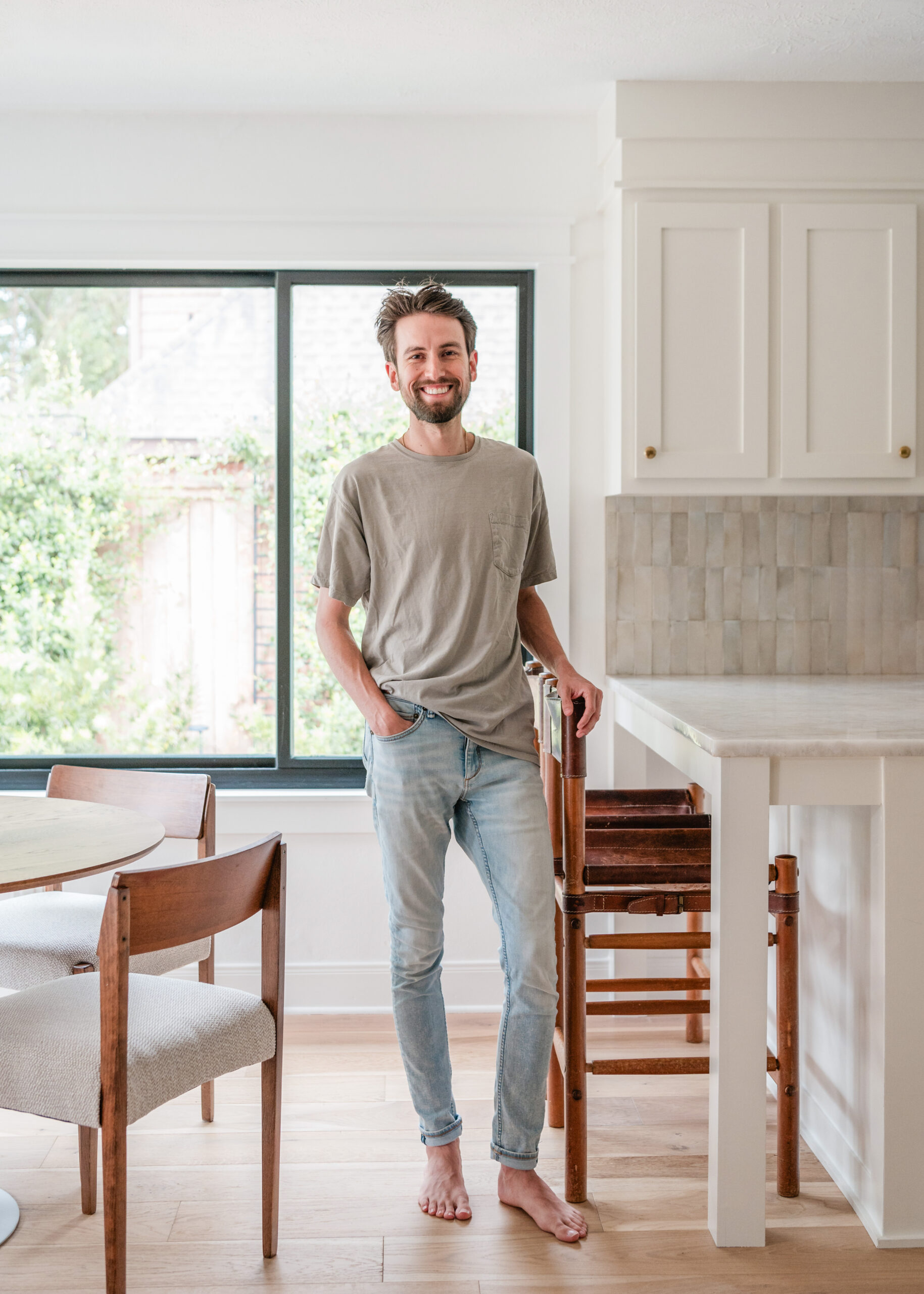 Male interior designer smiling for his interior design branding photoshoot