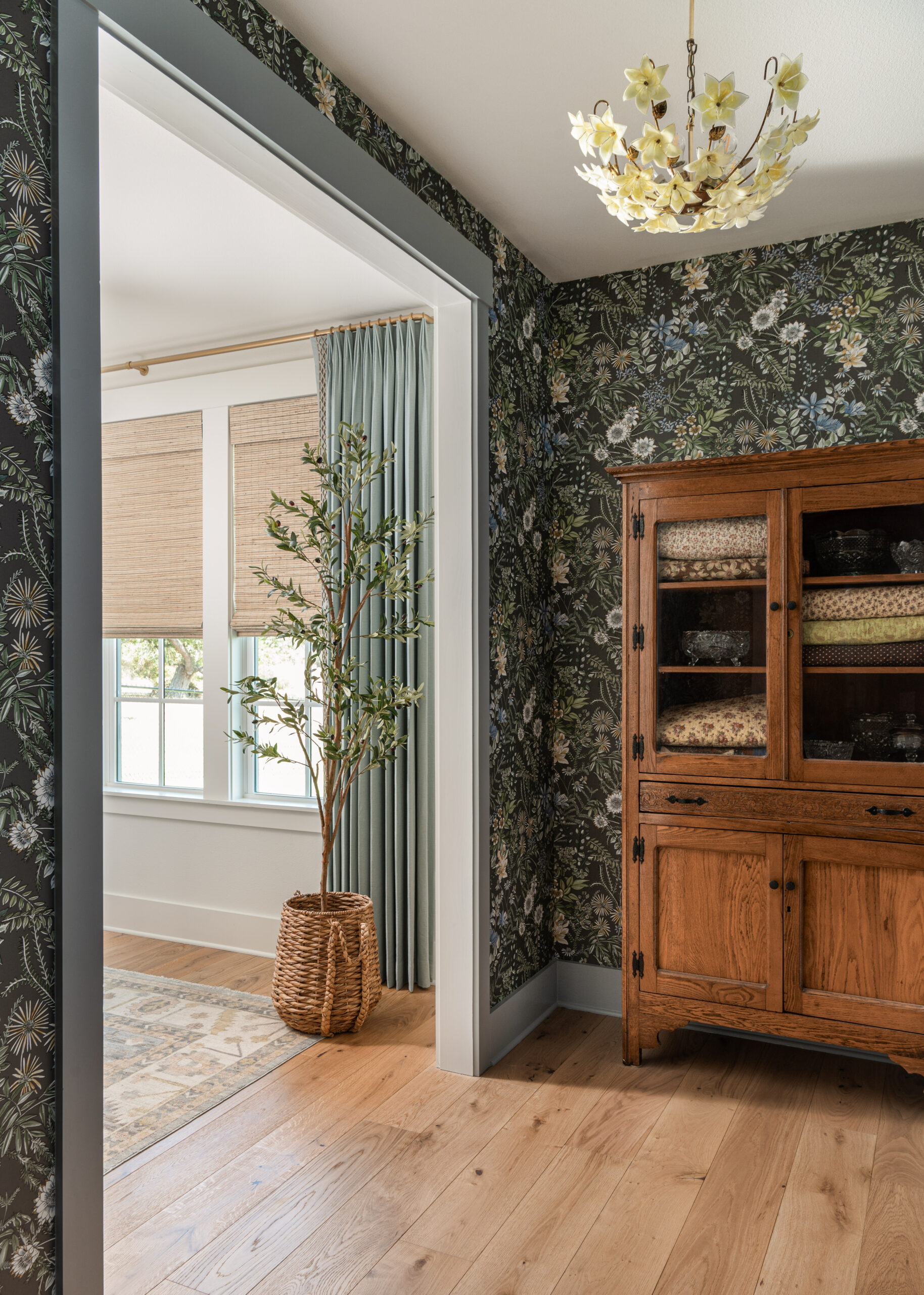 Vintage-inspired hallway featuring custom designed furniture, making the space feel both timeless and welcoming with a nod to custom interior design details.