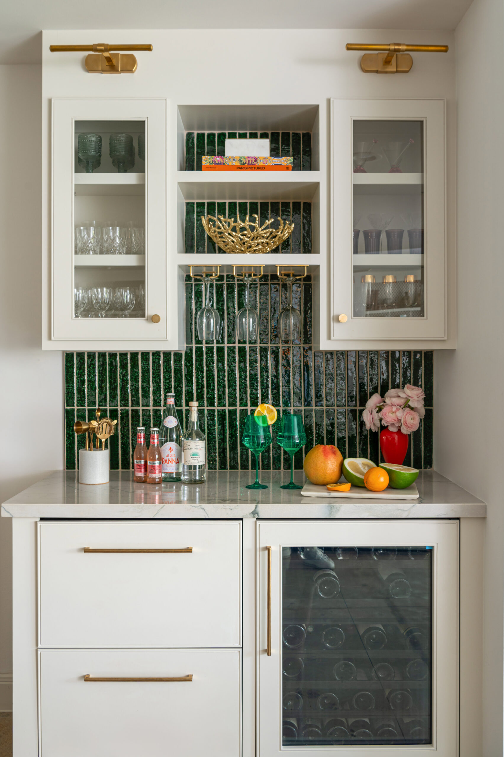 A vibrant, contemporary kitchen with green tile backsplash and colorful accessories. This interior design is enhanced by professional photography.