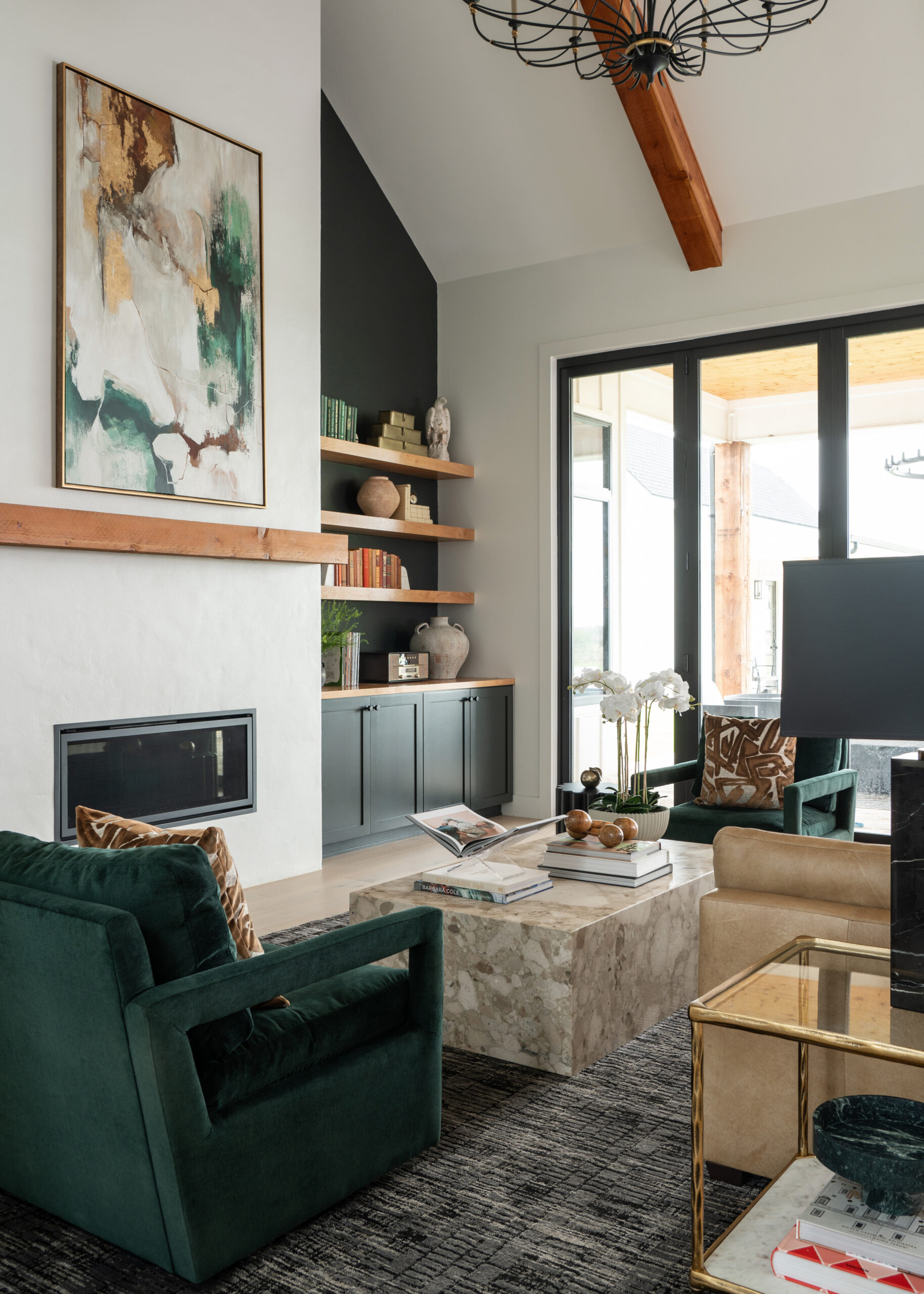 A cozy, stylish living area featuring a marble coffee table, comfortable seating, and modern décor elements that define modern home interior design.