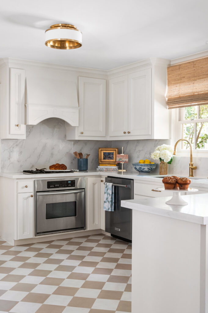 Kitchen with modern appliances and marble countertops